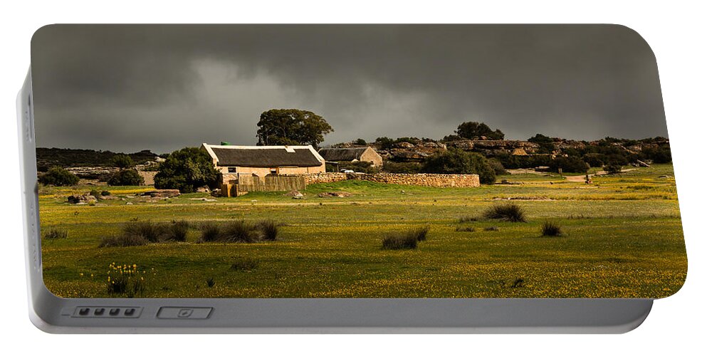 Landscape Portable Battery Charger featuring the photograph Spring breaking through by Claudio Maioli