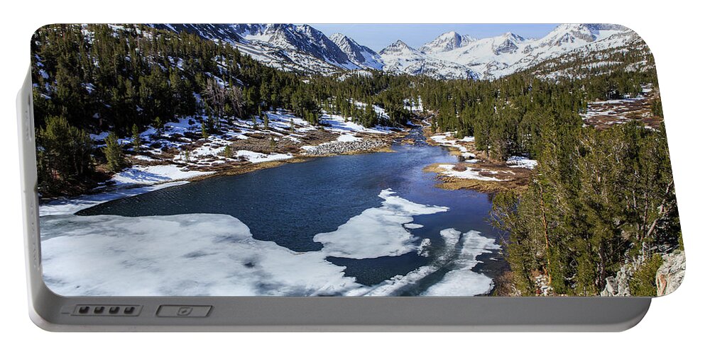 Mountain Lake Portable Battery Charger featuring the photograph Spring thaw by Duncan Selby