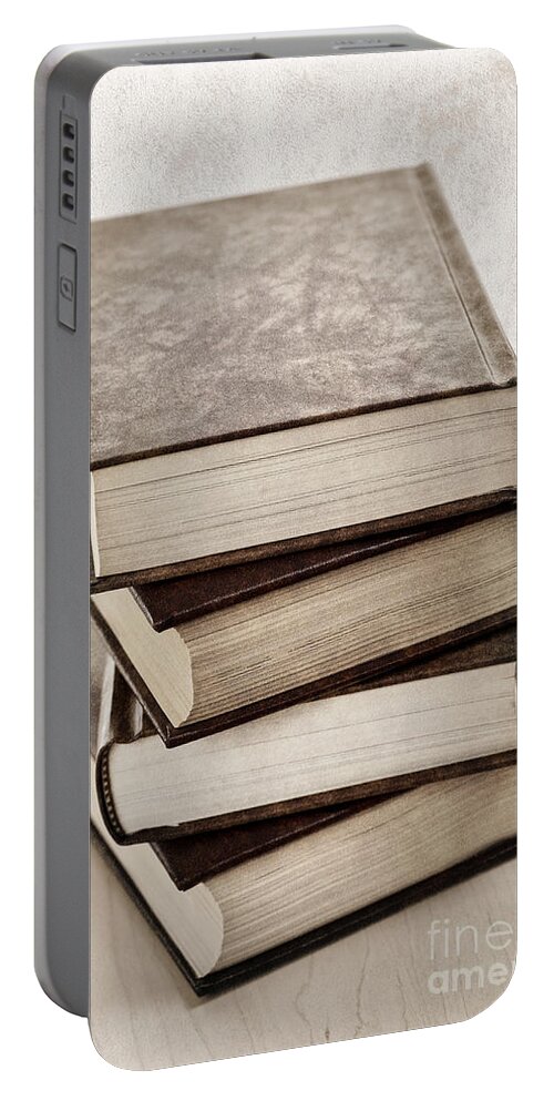 Books Portable Battery Charger featuring the photograph Stack of books by Elena Elisseeva