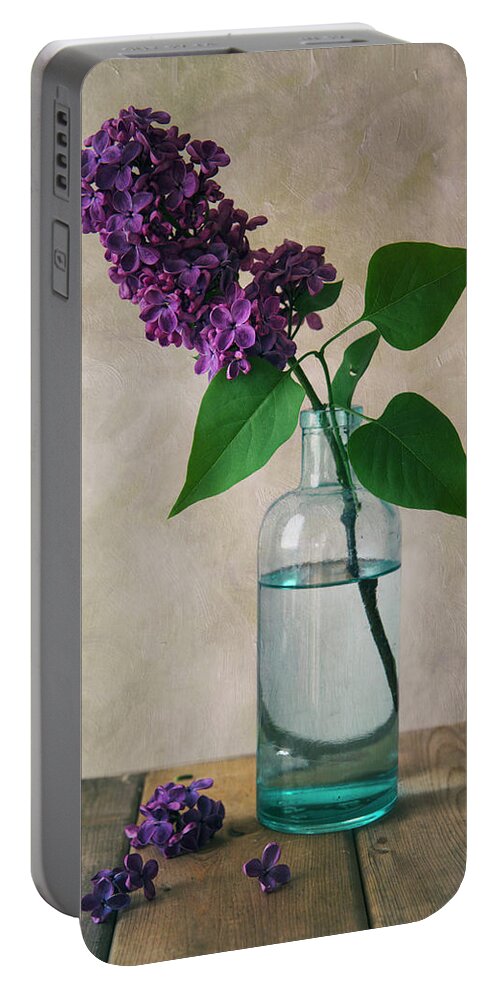 Lilac Portable Battery Charger featuring the photograph Still life with fresh lilac by Jaroslaw Blaminsky