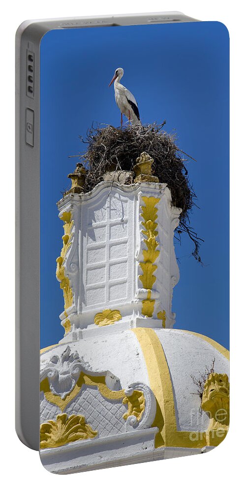 Portugal Portable Battery Charger featuring the photograph Stork's nest on turret Faro by Mikehoward Photography