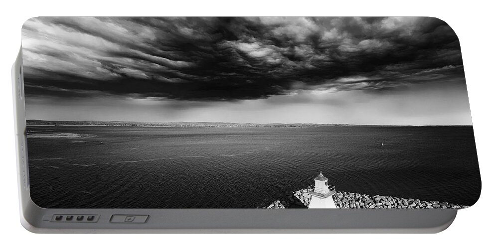Lighthouse Portable Battery Charger featuring the digital art Storm Clouds Over a Lighthouse by Julius Reque