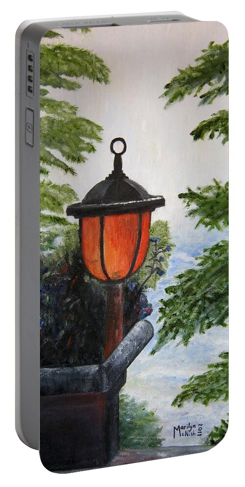 Solar Light Portable Battery Charger featuring the painting Storm on Lake of the Woods by Marilyn McNish