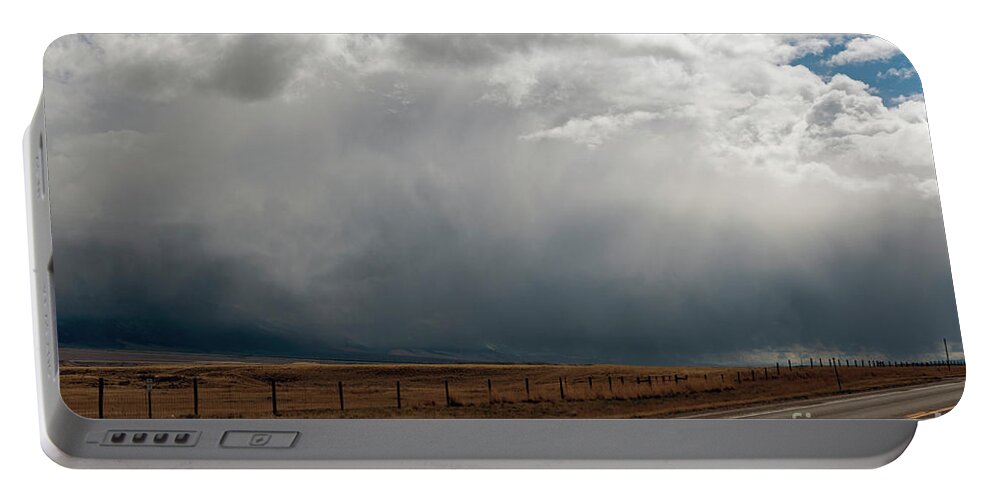 Storm Portable Battery Charger featuring the photograph Storm on route 287 N of Ennis MT by Cindy Murphy - NightVisions
