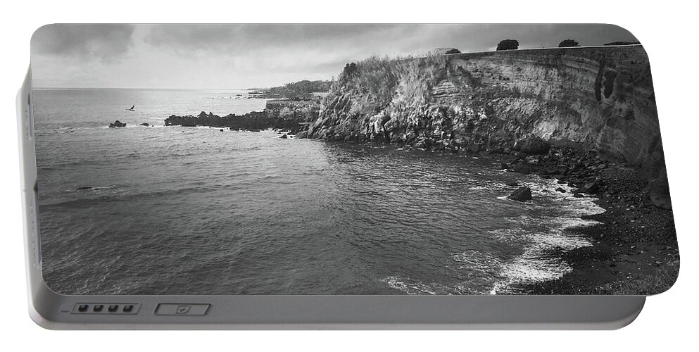 Kelly Hazel Portable Battery Charger featuring the photograph Storm Over the Eastern Shoreline of Angra do Heroismo Terceira by Kelly Hazel