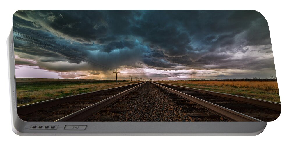 Storm Portable Battery Charger featuring the photograph Storm Tracks by Darren White