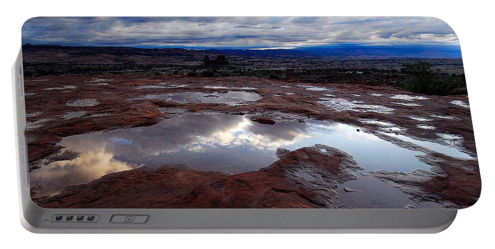 Reflection Portable Battery Charger featuring the photograph Stormy Sunrise by Harry Spitz