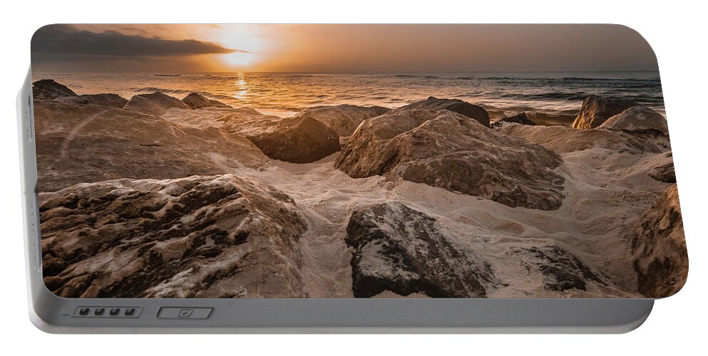 Alabama Portable Battery Charger featuring the photograph Sun coming over the rocks by John McGraw