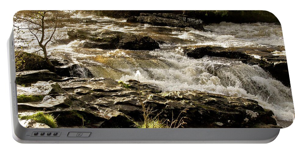 Sun Portable Battery Charger featuring the photograph Sun over rushing falls. Dochart. by Elena Perelman