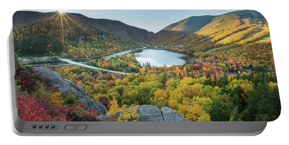 Sunburst Portable Battery Charger featuring the photograph Sunburst over Franconia Notch by White Mountain Images