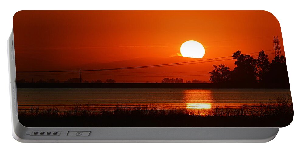Scenic Portable Battery Charger featuring the photograph Sundown by AJ Schibig
