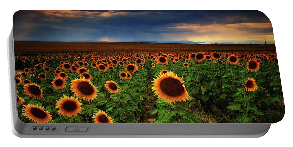 Colorado Portable Battery Charger featuring the photograph Sunflower Storms by John De Bord