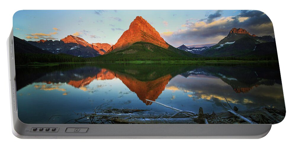Tranquility Portable Battery Charger featuring the photograph Sunrise at Many Glaciers by Craig J Satterlee