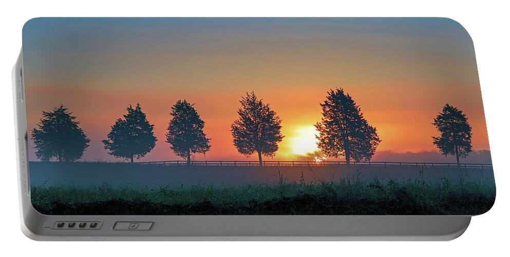 D Fa 28-105 Portable Battery Charger featuring the photograph Sunrise behind the Cedars by Lori Coleman