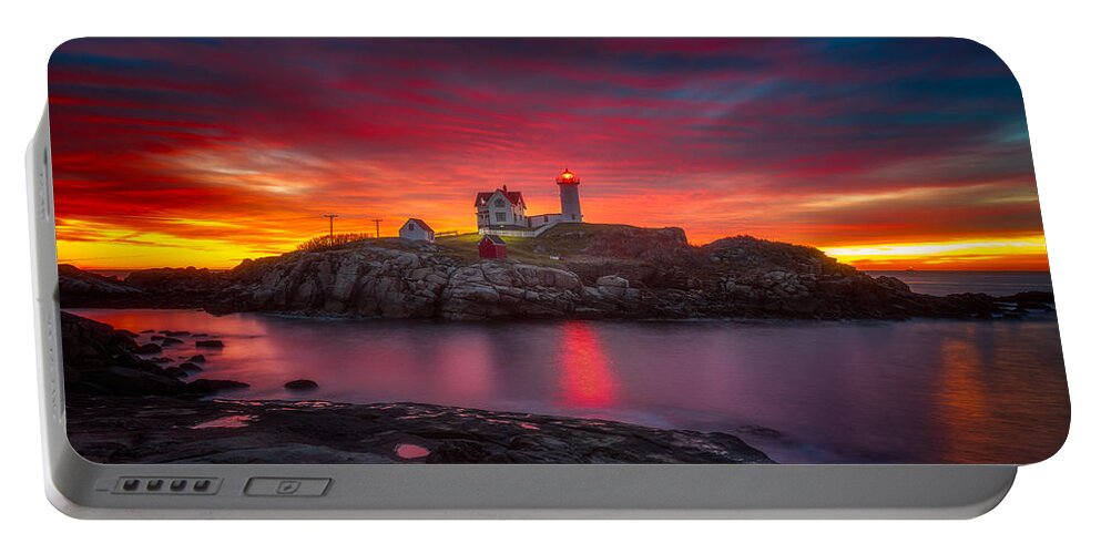 Sunrise Portable Battery Charger featuring the photograph Sunrise over Nubble Light by Darren White