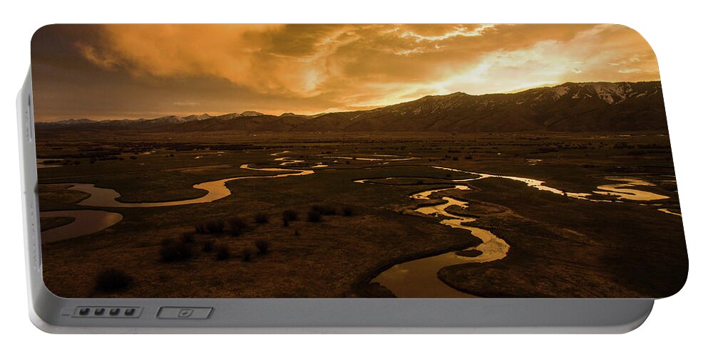 Wyoming Portable Battery Charger featuring the photograph Sunrise Over Winding Rivers by Wesley Aston