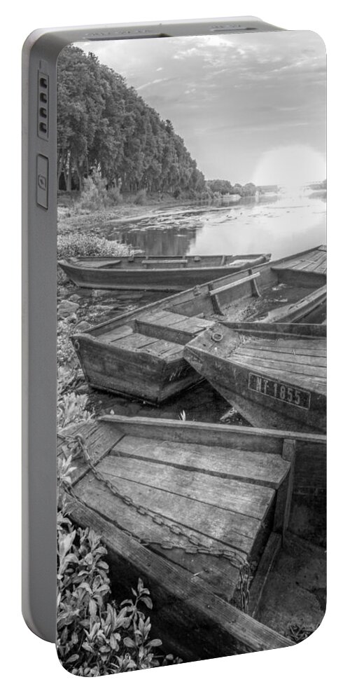 Boats Portable Battery Charger featuring the photograph Sunrise Rowboats in Black and White by Debra and Dave Vanderlaan