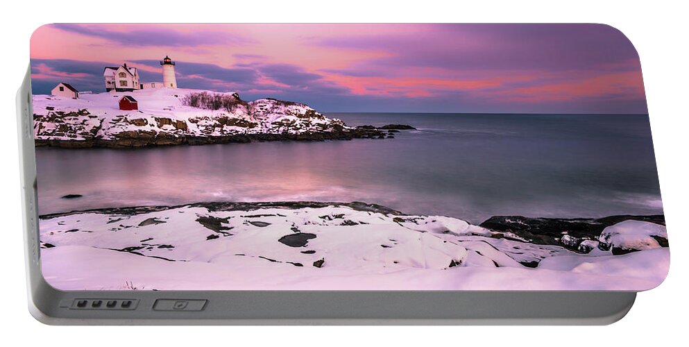 Maine Portable Battery Charger featuring the photograph Sunset at Nubble Lighthouse in Maine in Winter Snow by Ranjay Mitra