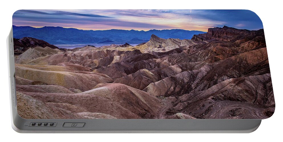 Death Valley Portable Battery Charger featuring the photograph Sunset at Zabriskie Point in Death Valley National Park by John Hight