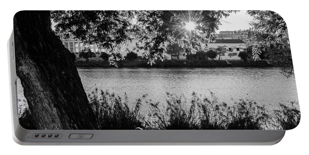 Seville Portable Battery Charger featuring the photograph Sunset on the Guadalquivir 2 by AM FineArtPrints