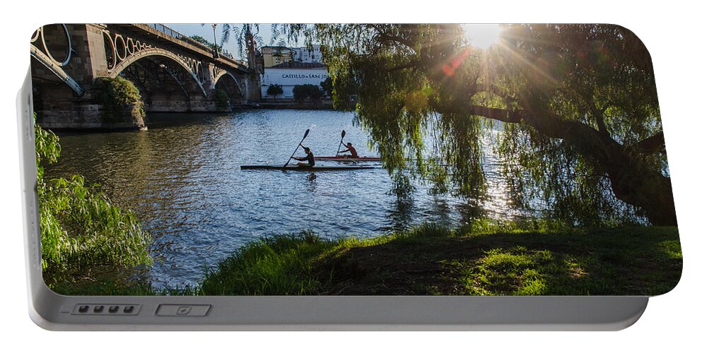 Seville Portable Battery Charger featuring the photograph Sunset on the river - Seville by AM FineArtPrints