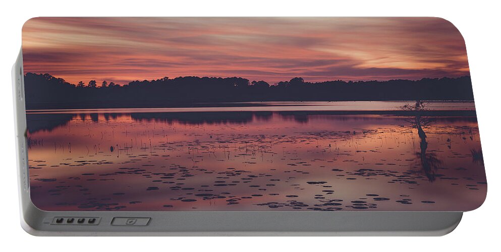 Sunset Portable Battery Charger featuring the photograph sunset over Bluff Lake Mississippi by Mati Krimerman