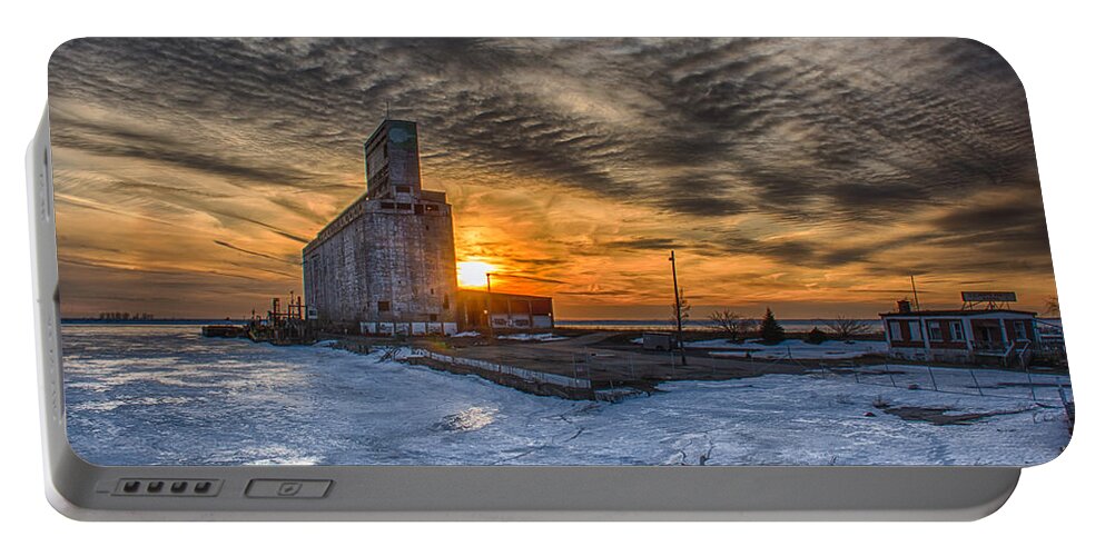 Buffalo Portable Battery Charger featuring the photograph Sunset Over Frozen Lake Erie by Guy Whiteley