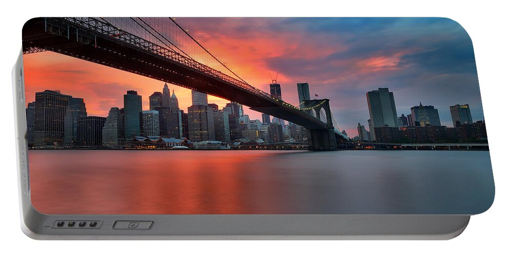 Sunset Portable Battery Charger featuring the photograph Sunset over Manhattan by Larry Marshall