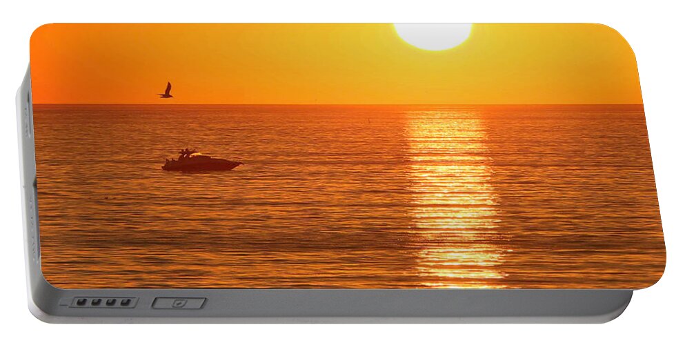 Ocean Portable Battery Charger featuring the photograph Sunset Solitude by Ed Clark