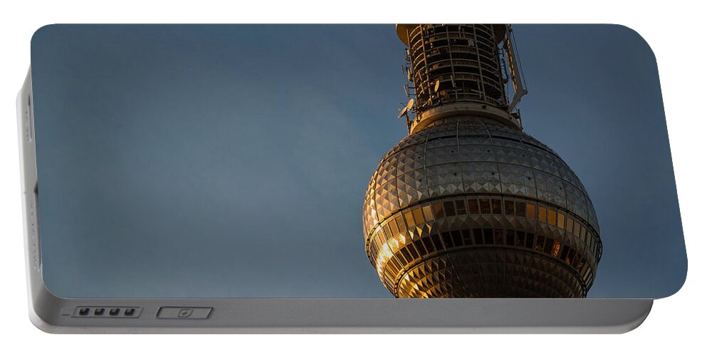 German Portable Battery Charger featuring the digital art Sunseting on the tower by Nathan Wright