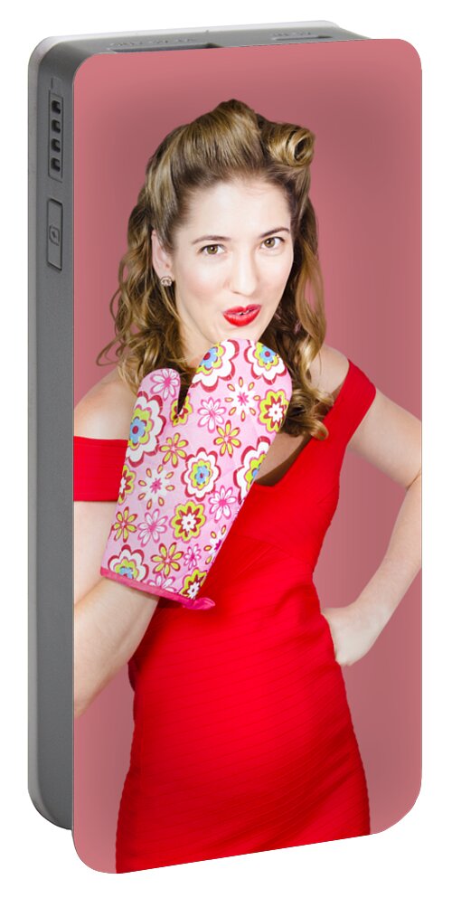 Funny Portable Battery Charger featuring the photograph Surprise cooking pinup woman with cook mitt by Jorgo Photography