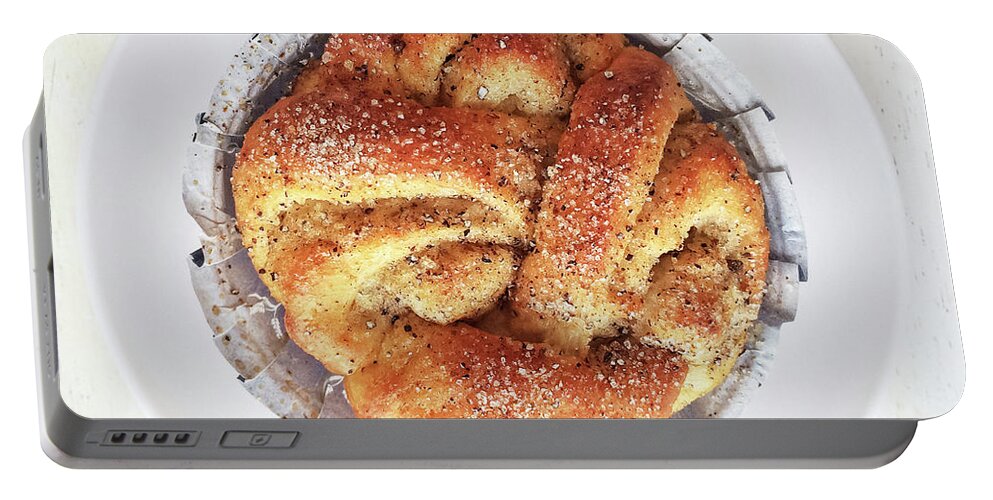 Pastry Portable Battery Charger featuring the photograph Sweet cardamom bun on a plate by GoodMood Art