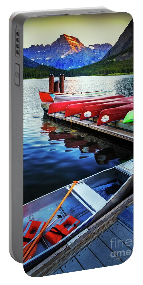 Landscape Portable Battery Charger featuring the photograph Swiftcurrent Lake and Canoes by Craig J Satterlee