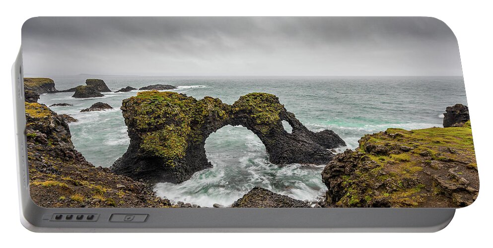 Iceland Portable Battery Charger featuring the photograph The Arch at Gatklettur by Rikk Flohr