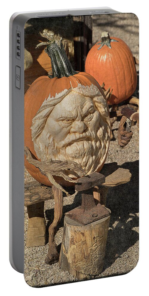 Pumpkin Portable Battery Charger featuring the photograph The Blacksmith 2 by Teresa Wilson