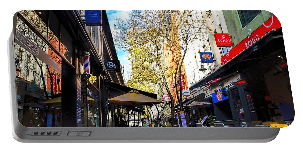 Cityscape Portable Battery Charger featuring the photograph The Cafe by Diana Mary Sharpton