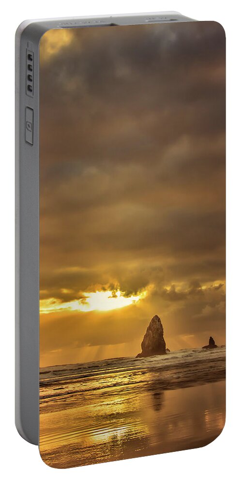 Cannon Beach Portable Battery Charger featuring the photograph The Evening Glow by Don Schwartz