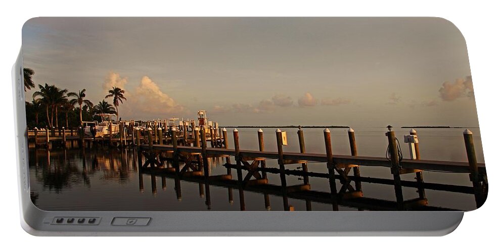 Pier Portable Battery Charger featuring the photograph The Evening Sun Goes Down by Michiale Schneider