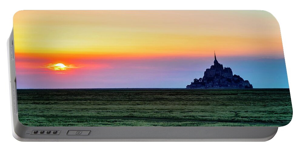 Abbey Portable Battery Charger featuring the photograph The Glow of Le Mont Saint-Michel at Sunset. by John Paul Cullen
