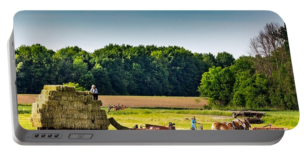 Mennonite Portable Battery Charger featuring the photograph The Hay Bales by Brent Buchner
