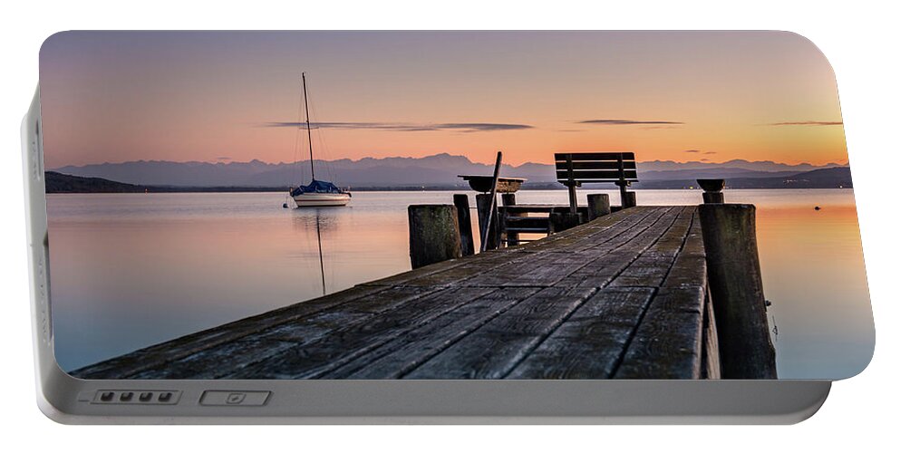 Ammersee Portable Battery Charger featuring the photograph The jetty to sunset by Hannes Cmarits