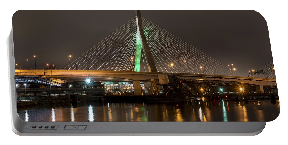Boston Portable Battery Charger featuring the photograph The Leonard P Zakim bridge lit up in green for St Patrick's Day Reflection by Toby McGuire