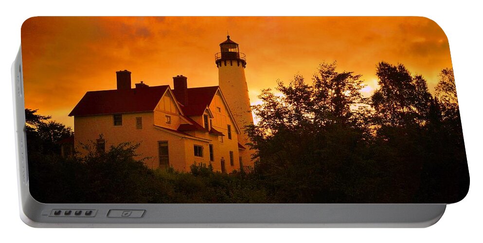  Portable Battery Charger featuring the photograph The Light at Dusk by Daniel Thompson
