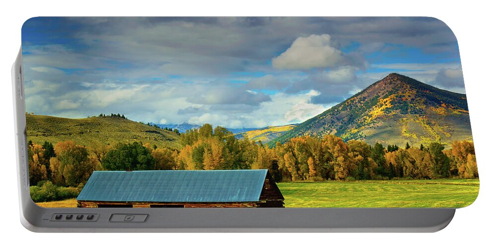 Aspen Portable Battery Charger featuring the photograph The Old Barn by John De Bord