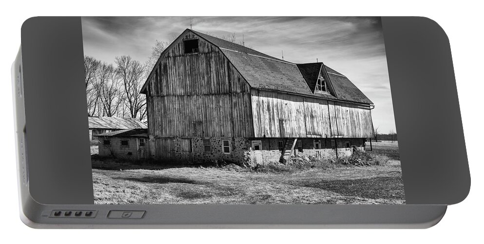 Monochrome Portable Battery Charger featuring the photograph The Old Barn by John Roach