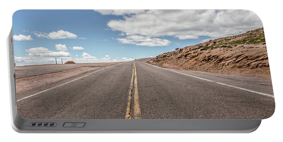 Architecture Portable Battery Charger featuring the photograph The Road up Pikes Peak at around 12,000 feet by Peter Ciro