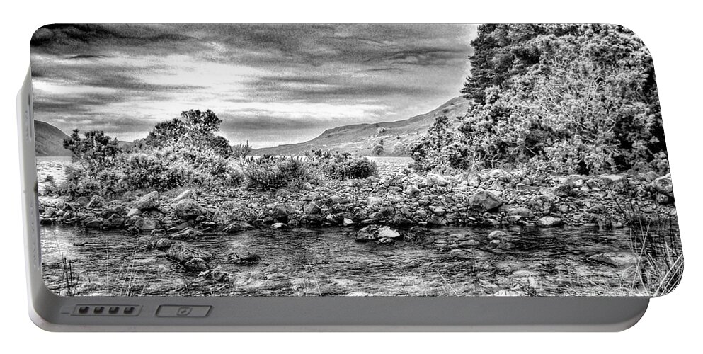 The English Lake District Portable Battery Charger featuring the photograph The Rocky Shores of Wastwater in Greyscale by Joan-Violet Stretch