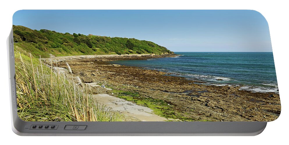 Britain Portable Battery Charger featuring the photograph The Rugged Castle Beach - Falmouth by Rod Johnson