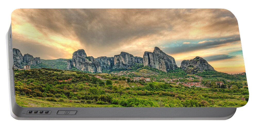 Christianity Portable Battery Charger featuring the photograph The sunrise at Meteora - Greece by Constantinos Iliopoulos