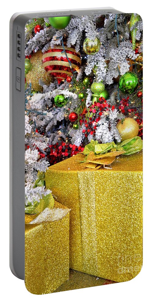 Christmas Portable Battery Charger featuring the photograph The Surprise Under The Tree by Mary Deal